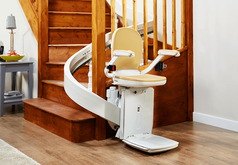 Curved stair lift on a curved staircase